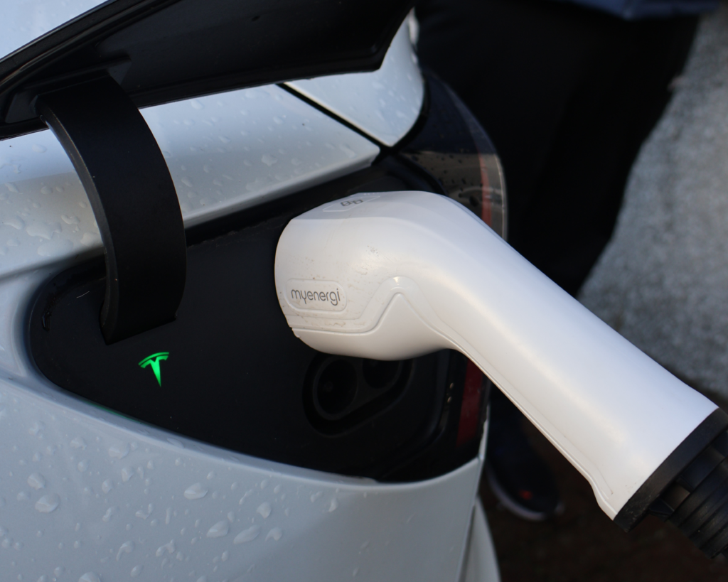 Zappi myenergi EV charger plugged into a Tesla 